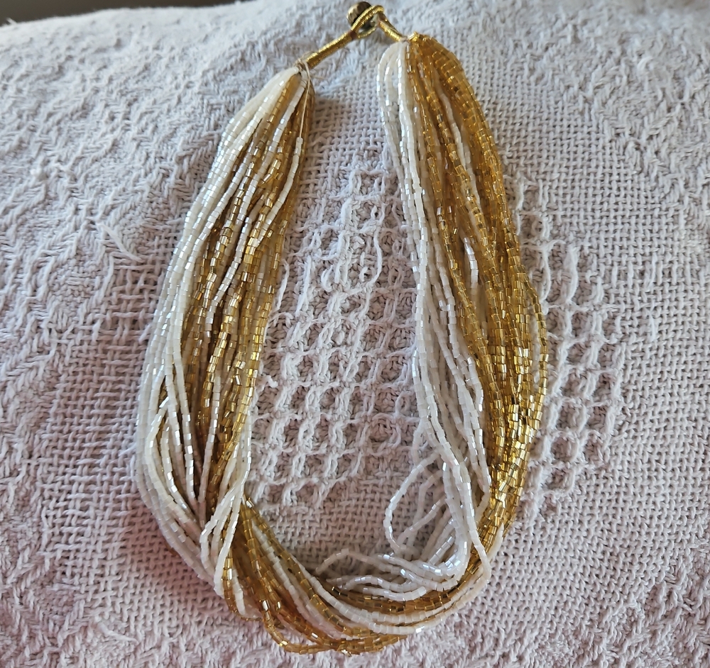 Elegant Gold and White Beaded Necklace